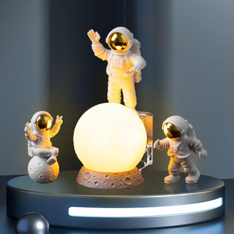 Astronautas na lua - ornamento para escritório e decoração